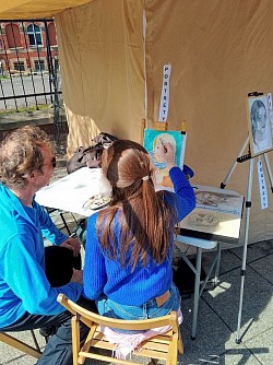 Artists painting portraits